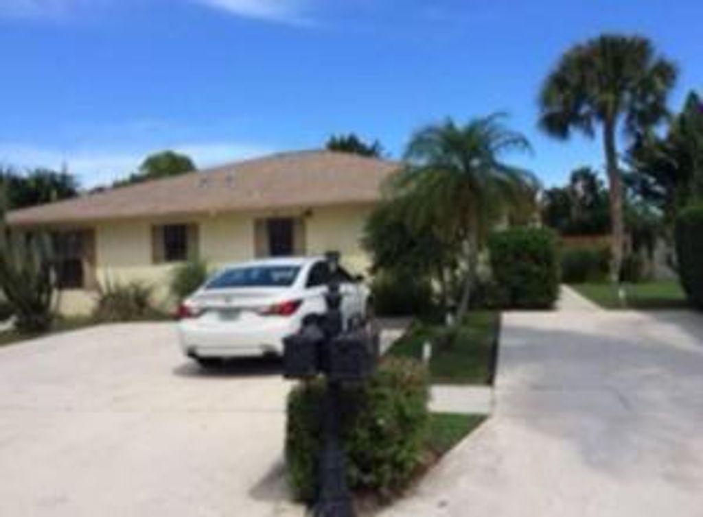 Photo of 9130 E Highland Pines Boulevard, Palm Beach Gardens, FL 33418 (MLS # R10770238)