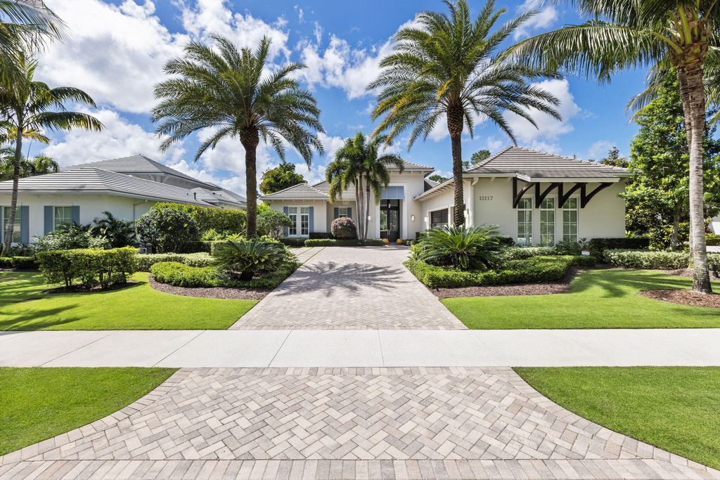 Photo of 12117 Plantation Way, Palm Beach Gardens, FL 33418 (MLS # R10985069)