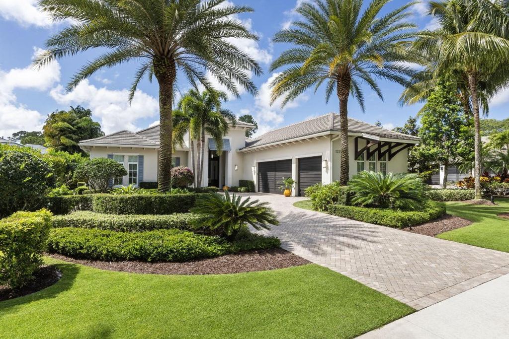 Photo of 12117 Plantation Way, Palm Beach Gardens, FL 33418 (MLS # R10985069)