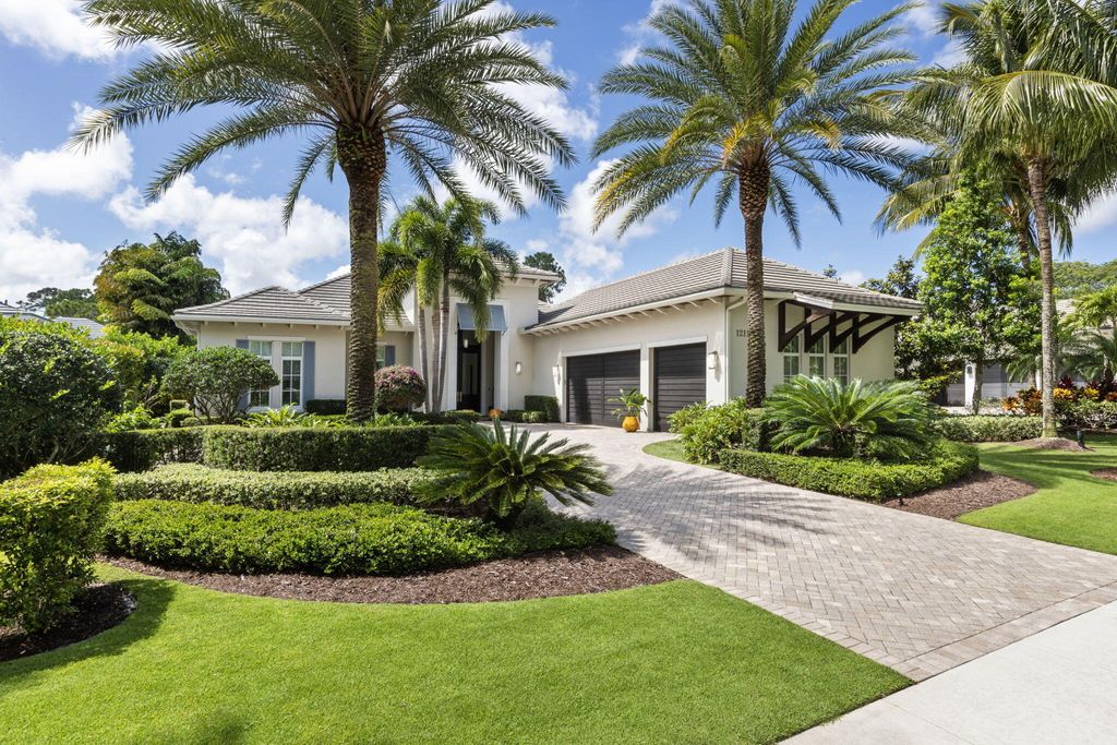 Photo of 12117 Plantation Way, Palm Beach Gardens, FL 33418 (MLS # R10985069)