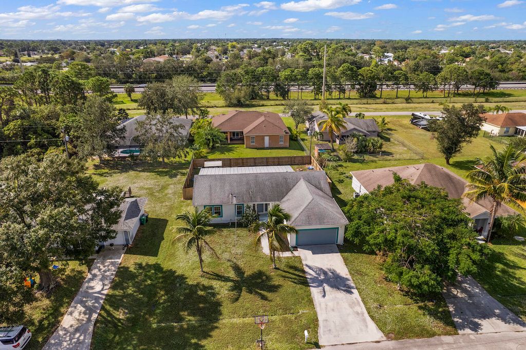 Photo of 2526 SW Cooper Lane, Port Saint Lucie, FL 34984 (MLS # R10867014)