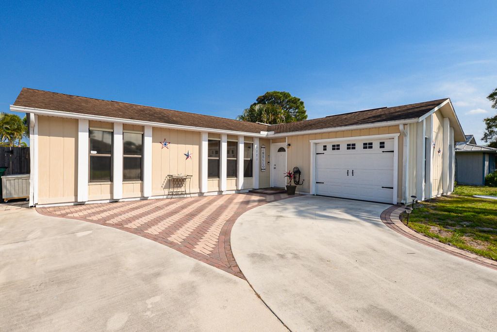 Photo of 1331 SE Navajo Lane, Port St Lucie, FL 34983 (MLS # R10869755)