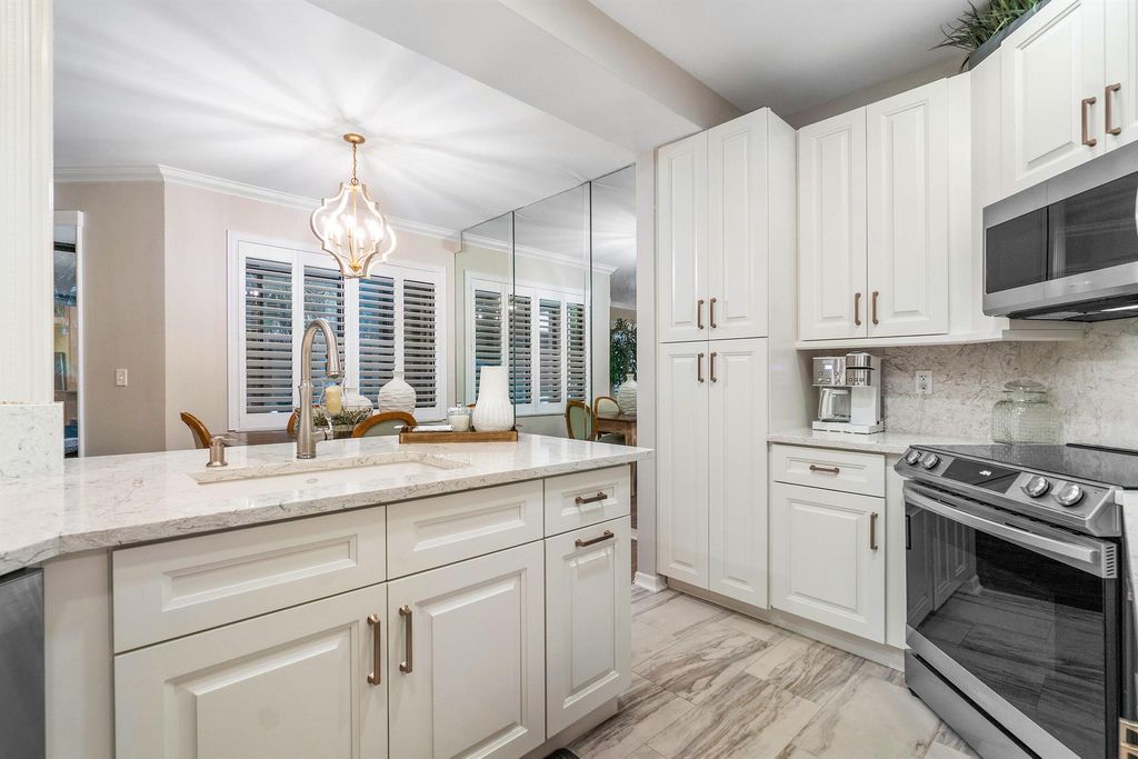 Photo of 301 Sea Oats Drive #C, Juno Beach, FL 33408 (MLS # R10967045)