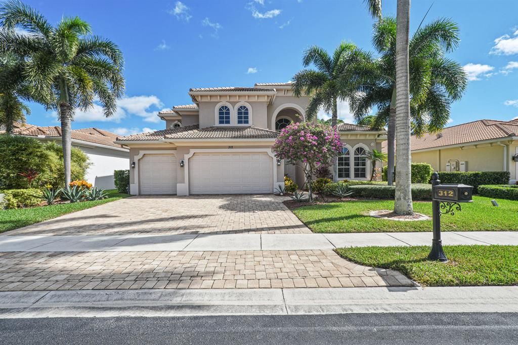 Photo of 312 Charroux Drive, Palm Beach Gardens, FL 33410 (MLS # R10753450)