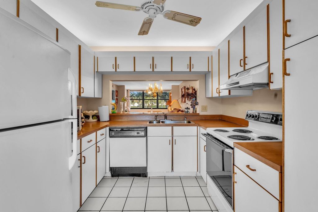 Photo of 10643 W Clairmont Circle #202, Tamarac, FL 33321 (MLS # F10554348)