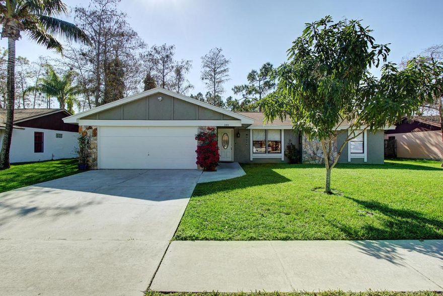 Cozy single family one story home with split bedroom floorplan. 4 bedrooms, 2 bathrooms, 2 car garage with a sunroom. Tile and laminate floors throughout. Spacious master bedroom with walk in closet. Private fenced in backyard that overlooks the water and preserve. A/C is 2 years old. A short walk to the rec center in this sidewalk lined neighborhood. Shopping and restaurants are close by.