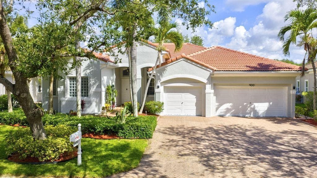 Photo of 900 NW 123rd Drive, Coral Springs, FL 33071 (MLS # F10535287)