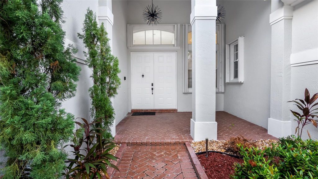 Photo of 900 NW 123rd Dr, Coral Springs, FL 33071 (MLS # F10535287)