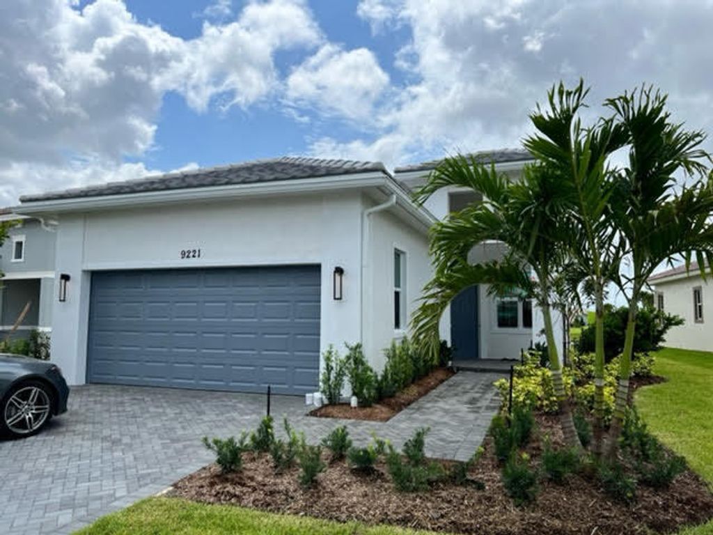 Photo of 9221 SW Michele Way Way, Port St Lucie, FL 34987 (MLS # R10812308)