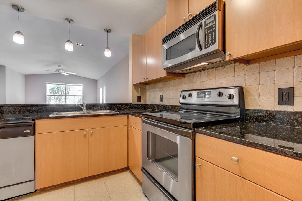 Photo of 1740 PALM COVE Boulevard #4-305, Delray Beach, FL 33445 (MLS # B26075526)