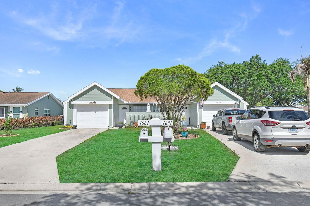 Photo of 1661 SE Kestwick Court, Port Saint Lucie, FL 34952 (MLS # B26022013)