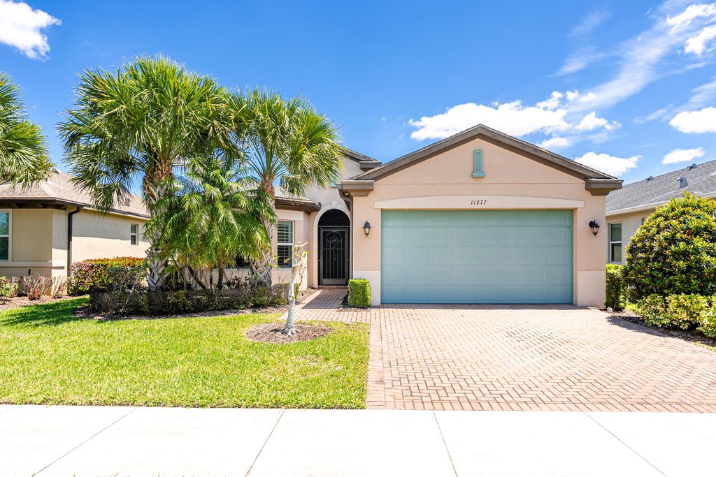 Photo of 11277 SW Lake Park Drive, Port Saint Lucie, FL 34987 (MLS # B26015970)