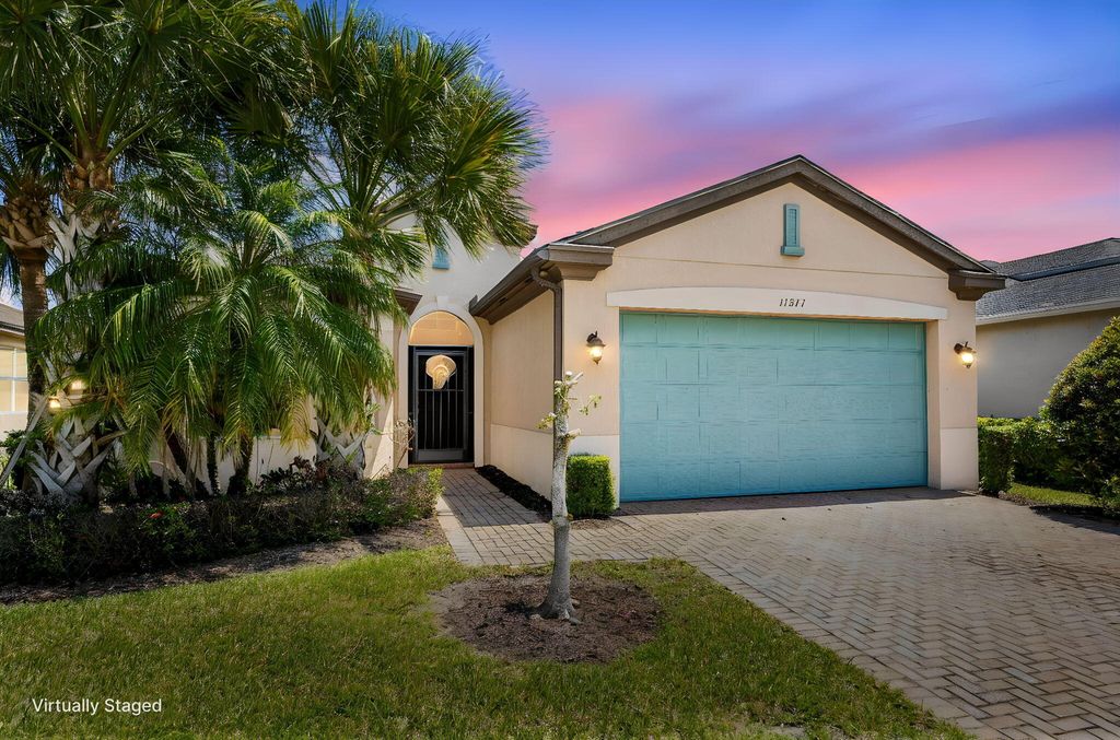 Photo of 11277 SW Lake Park Drive, Port Saint Lucie, FL 34987 (MLS # B26015970)