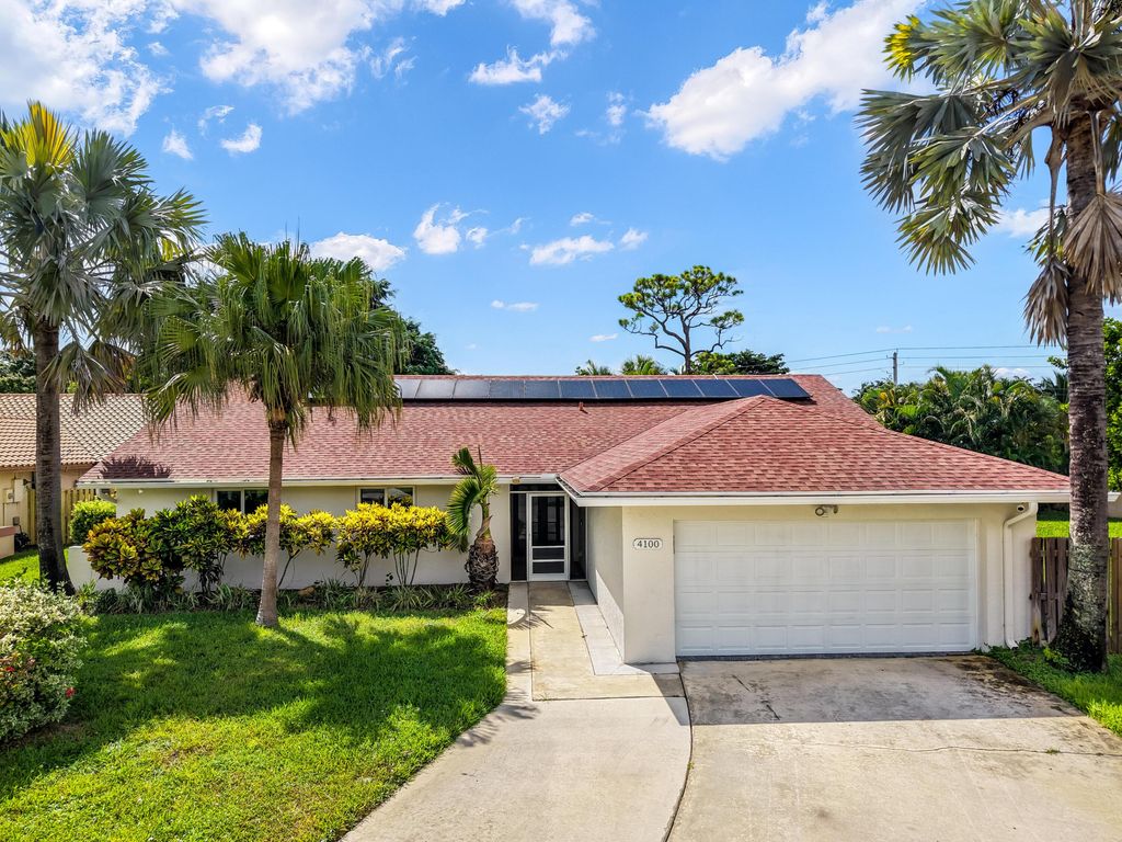 Photo of 4100 NW 7th Lane, Delray Beach, FL 33445 (MLS # R11114859)