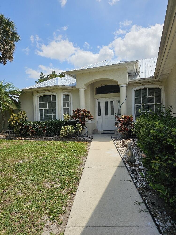 This is it! Location, location on the C24 canal! This new to market CBS salt POOL home checks all the boxes.... The home's features include a new METAL ROOF, New AC, newer HW heater, screened lanai and newer pool pump. The home has been expanded by the previous owner to include a mother in law suite perfect for the growing family! Soaring ceilings make the home feel light and bright. Also, the garage entry has been heightened so you can house your boat or small RV. Fish, boat or kayak right from your back yard (dock can be added per the owner). Easy access to 95, Turnpike and shopping galore. Make this home yours with a little TLC. Call today for your personal tour.