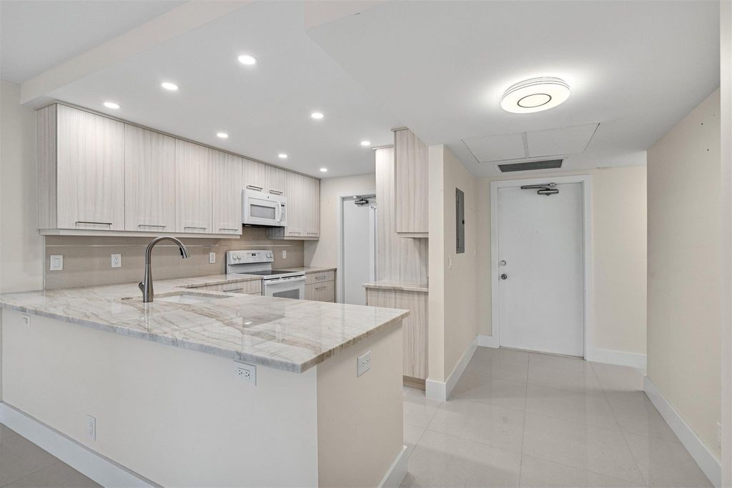Photo of 2901 S Palm Aire Drive #106, Pompano Beach, FL 33069 (MLS # F10454625)