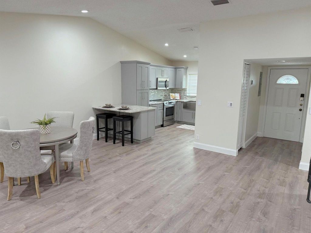Photo of 21 Chelsea Lane, Boynton Beach, FL 33426 (MLS # R11126454)