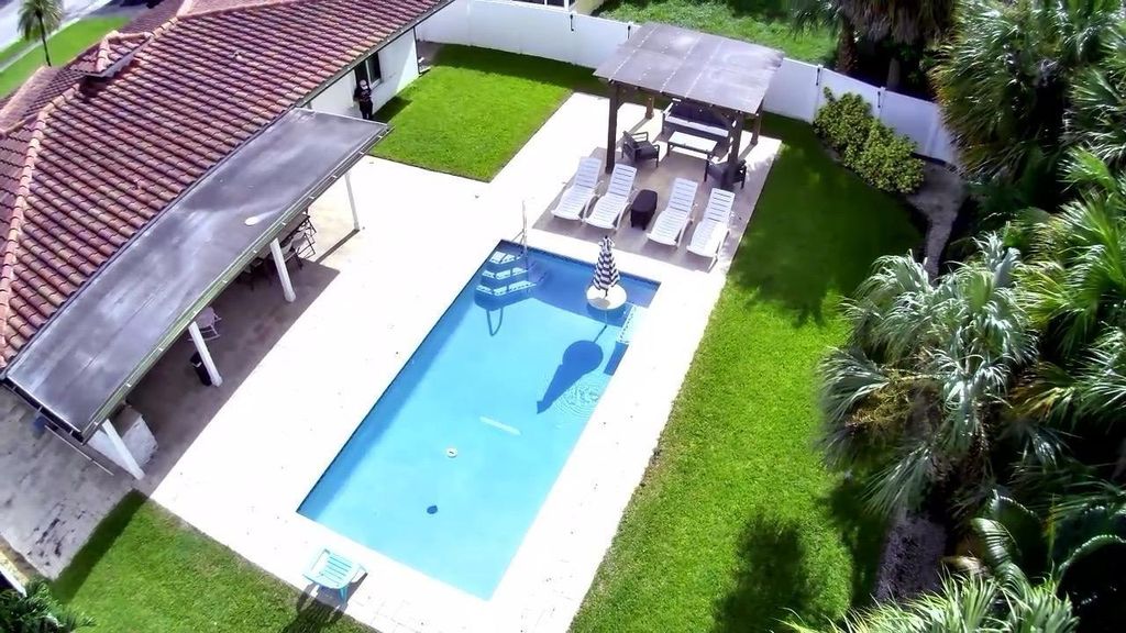 Photo of 1050 NW 45th Street, Deerfield Beach, FL 33064 (MLS # F10488825)