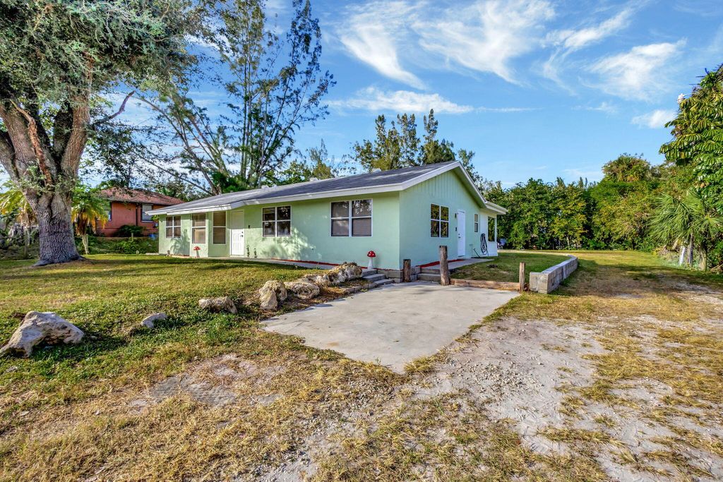 Photo of 12435 59th Street N, The Acreage, FL 33411 (MLS # R11047748)