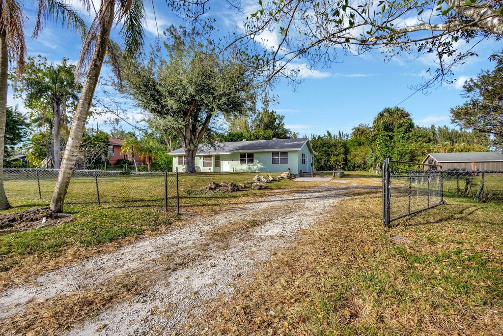 Photo of 12435 59th Street N, The Acreage, FL 33411 (MLS # R11047748)