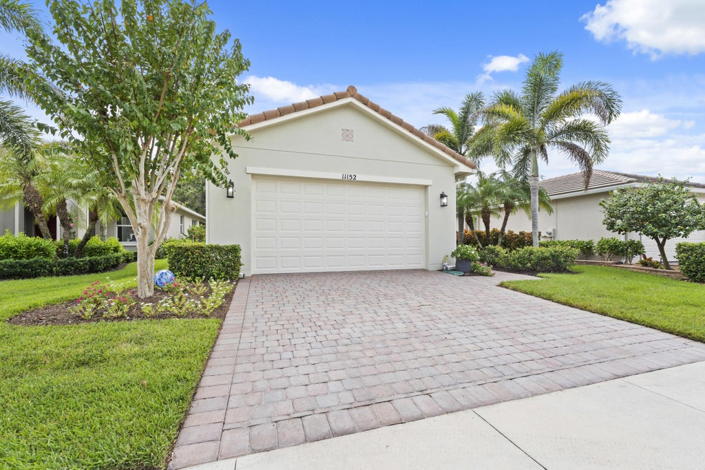 Photo of 11152 SW Birch Tree Circle, Port Saint Lucie, FL 34987 (MLS # B26082206)