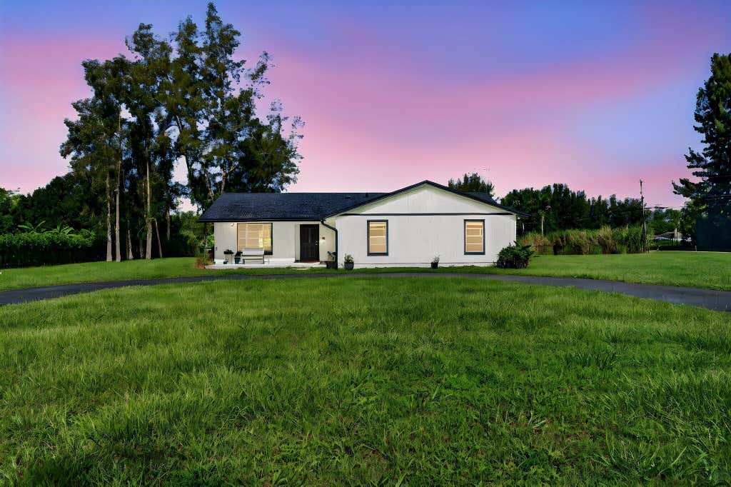 Photo of 5989 COCONUT Boulevard, The Acreage, FL 33411 (MLS # B26056184)