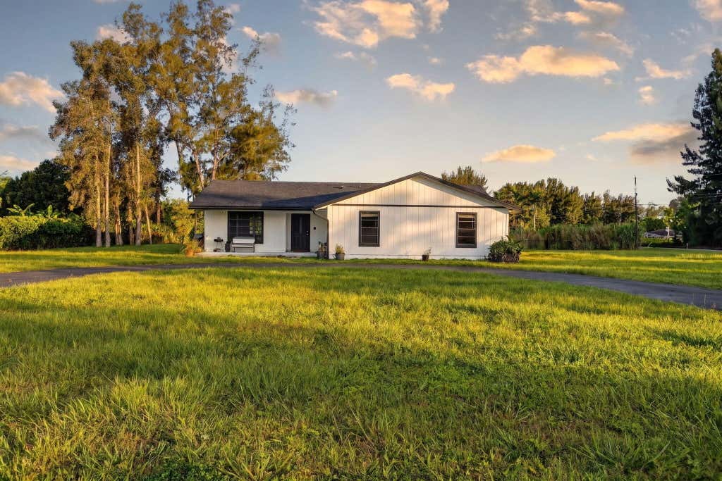 Photo of 5989 COCONUT Boulevard, The Acreage, FL 33411 (MLS # B26056184)