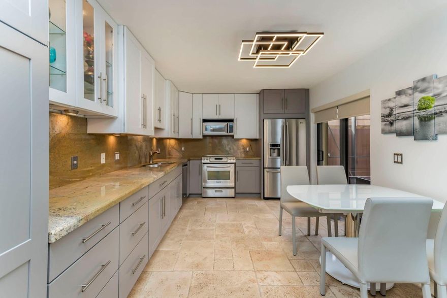 This 3-bed, 2.5-bath townhome offers a spacious floorplan, modern lighting & fixtures, plus a completely screened-in patio! The updated kitchen features stainless appliances and granite countertops. The main level includes a large living room and bedroom/office/den. Upstairs, the primary bedroom boasts a private balcony and an ensuite with dual sinks and a custom slate shower. The guest room includes a balcony overlooking the courtyard. Pine Island Ridge is a walkable community with many amenities, like a country club membership, pool, fitness center, tennis/basketball/bocce courts, and a playground. You’ll be less than 5 minutes from shopping & dining options, and you can hop on I-595 in no time.