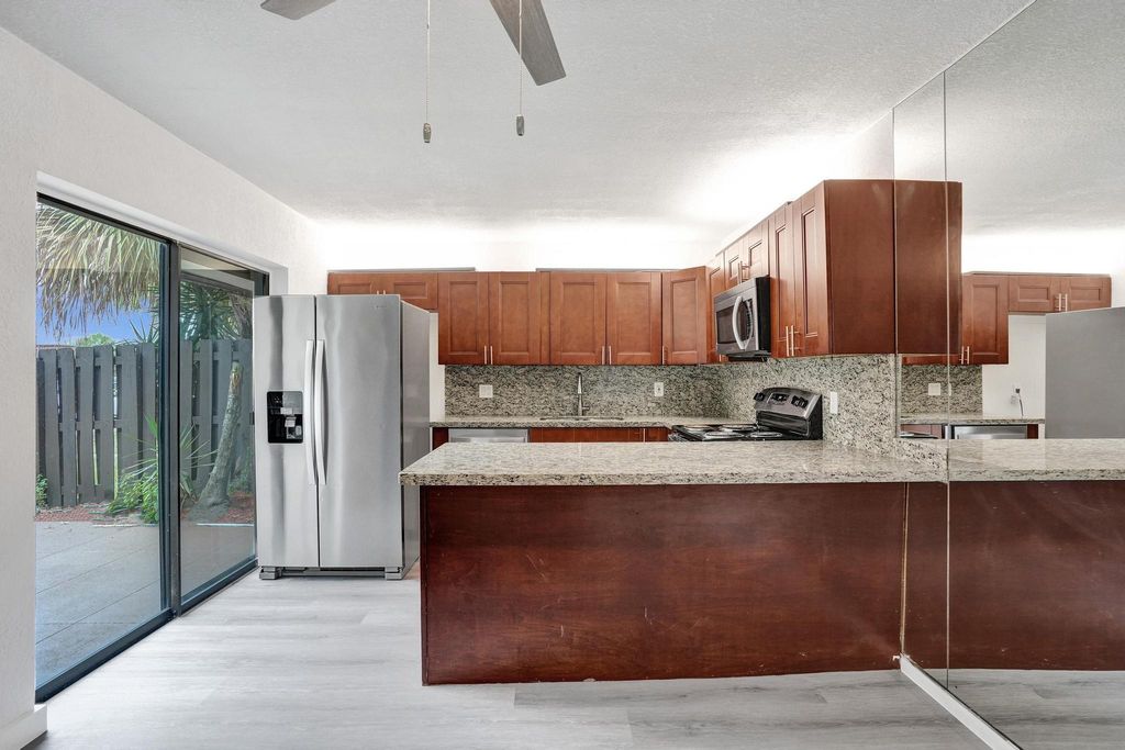 Photo of 6435 Red Pine Lane #B, Greenacres, FL 33415 (MLS # F10505561)