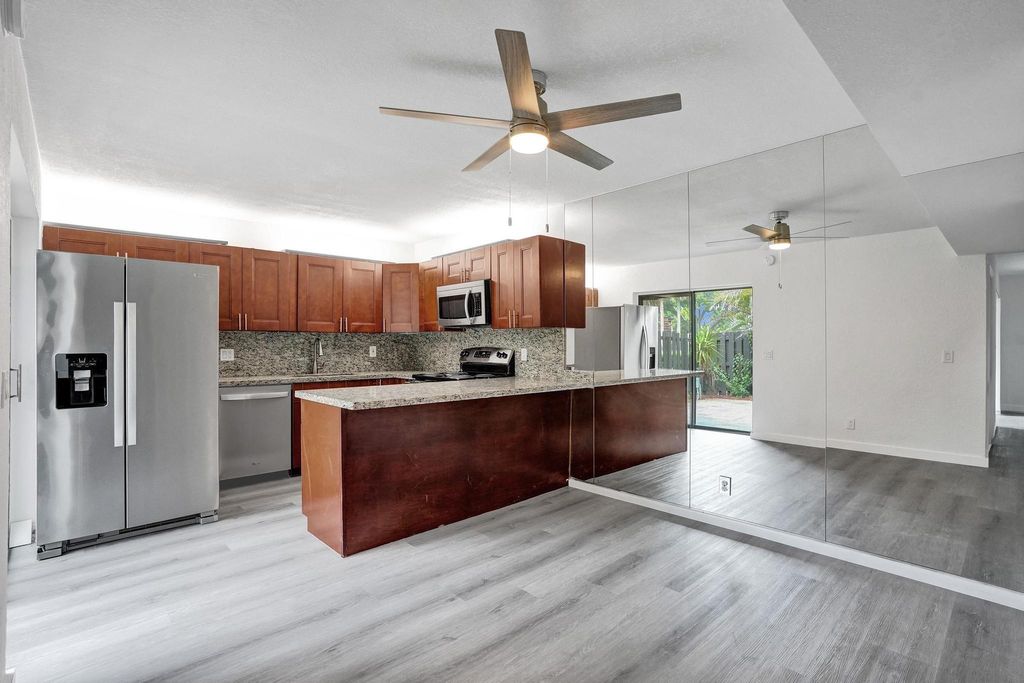 Photo of 6435 Red Pine Lane #B, Greenacres, FL 33415 (MLS # F10505561)