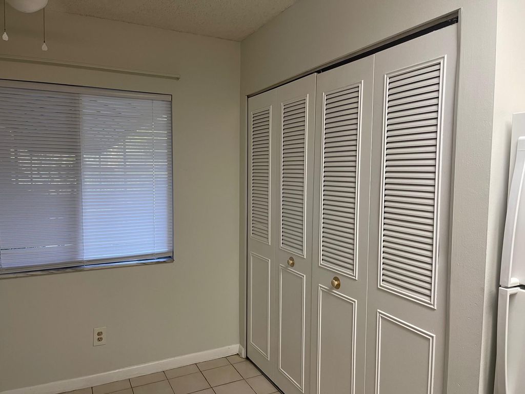 Photo of 2212 S Cypress Bend Drive #104, Pompano Beach, FL 33069 (MLS # F10414861)