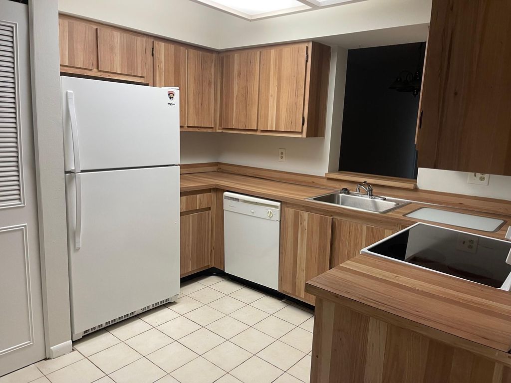Photo of 2212 S Cypress Bend Drive #104, Pompano Beach, FL 33069 (MLS # F10414861)
