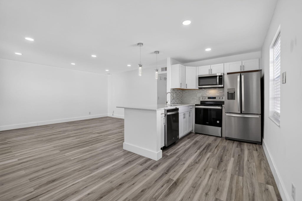 Photo of 515 Normandy Lane, Delray Beach, FL 33484 (MLS # B26072765)