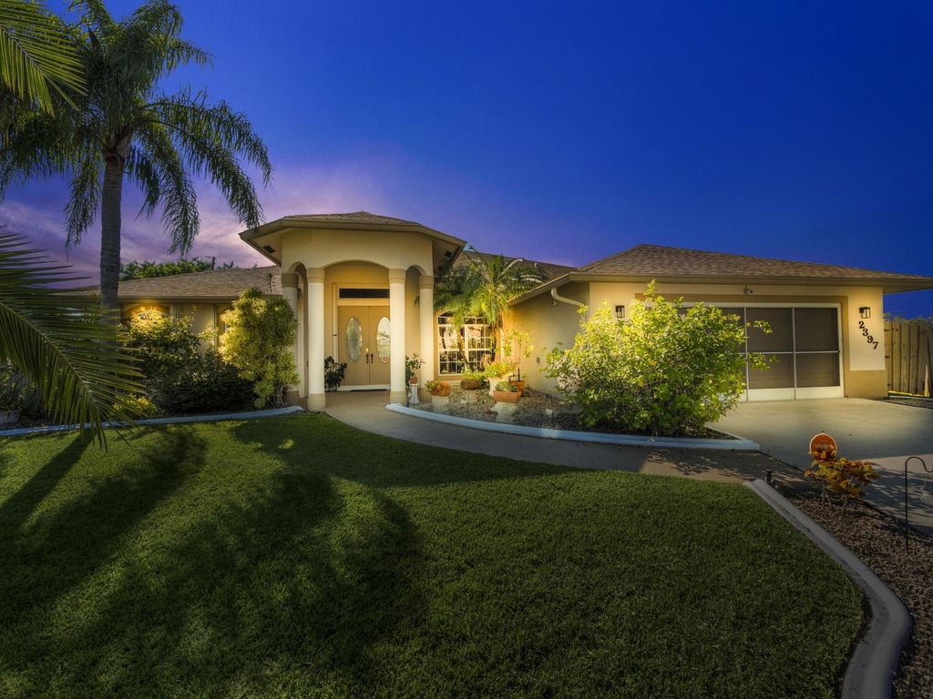 Photo of 2397 SW Norton Street, Port Saint Lucie, FL 34953 (MLS # R10967576)