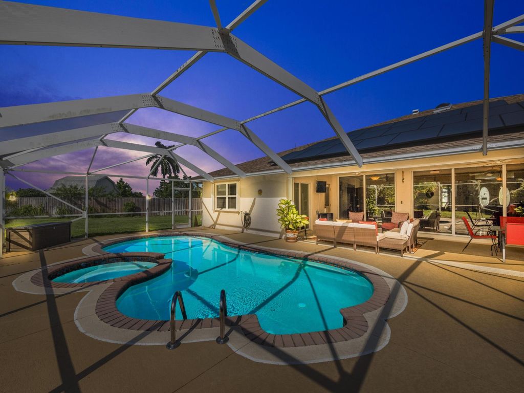 Photo of 2397 SW Norton Street, Port Saint Lucie, FL 34953 (MLS # R10967576)