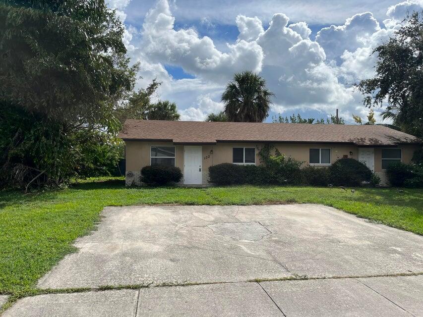 Nice 2/1 Duplex Villa with impact windows & tile throughout. Large yard & no HOA