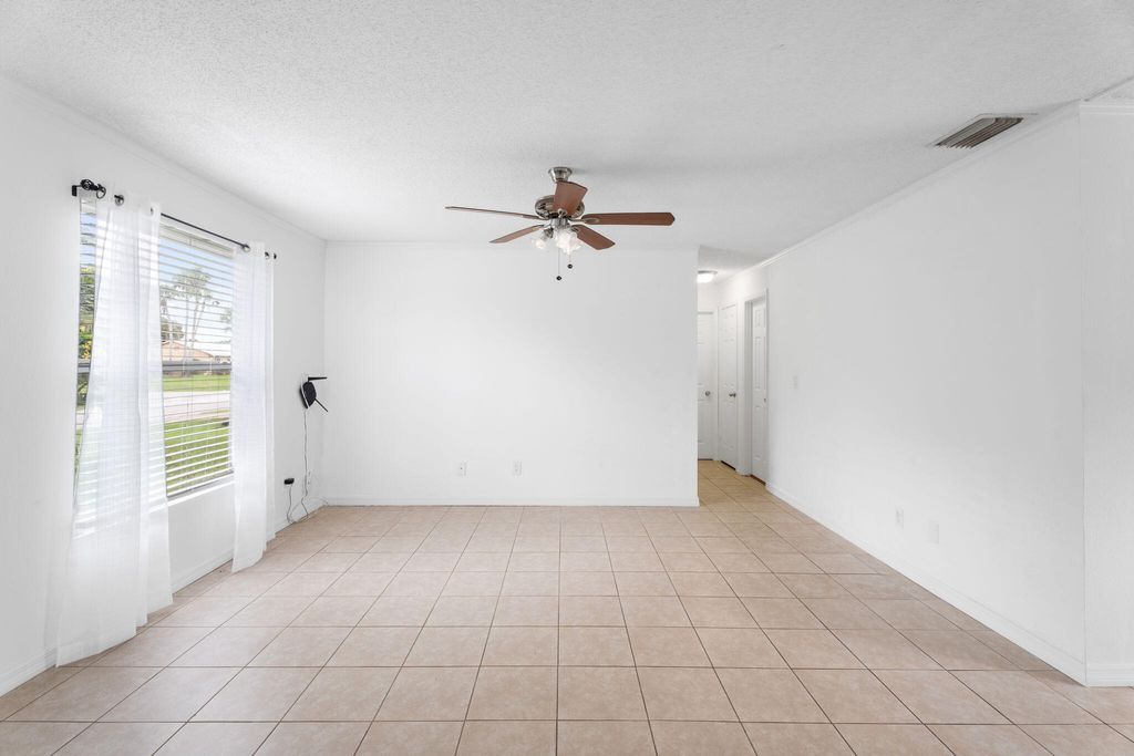 Photo of 1057 SW Gastador Avenue, Port Saint Lucie, FL 34953 (MLS # R11121052)