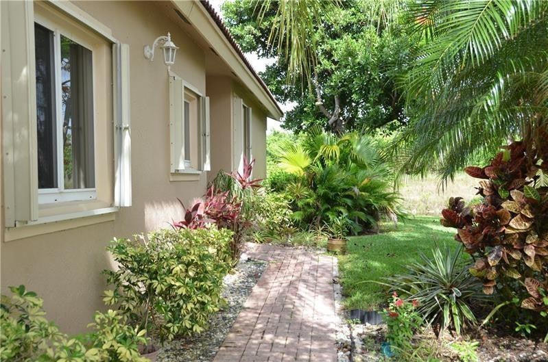 Photo of 5766 NW 127th Terrace, Coral Springs, FL 33076 (MLS # B26062443)
