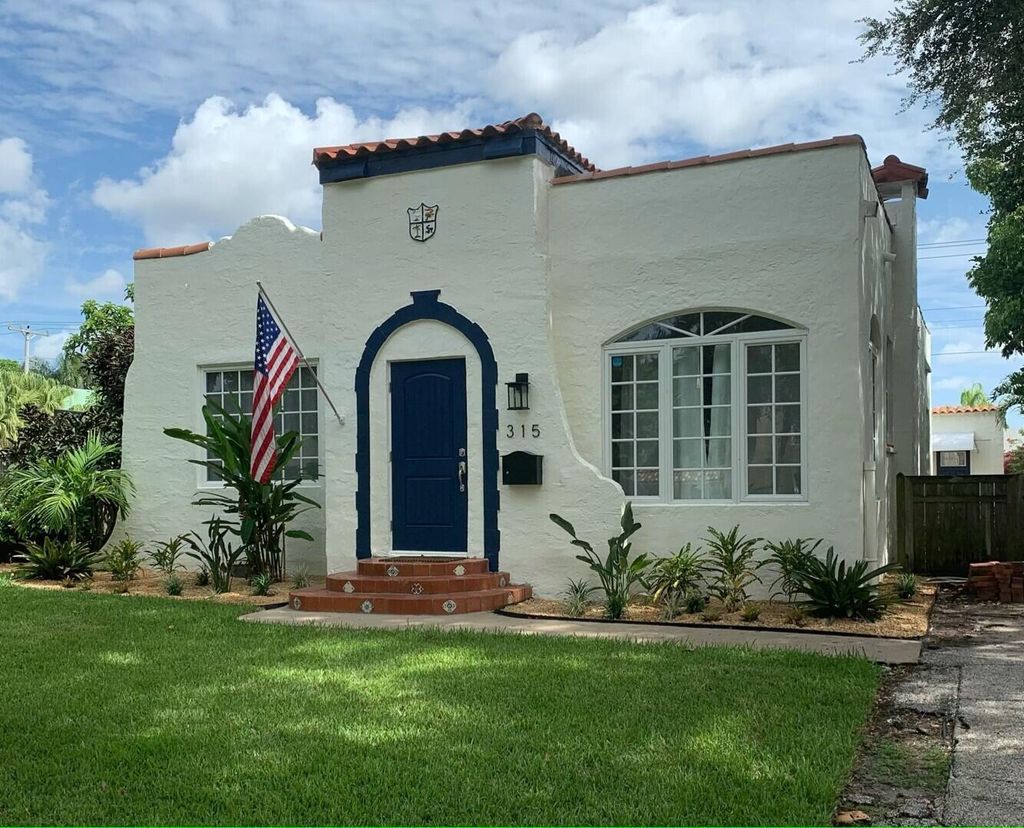 Photo of 315 Hawthorne Drive, Lake Park, FL 33403 (MLS # R10939983)