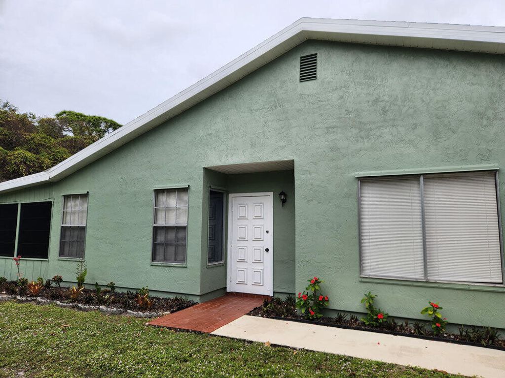 Photo of 1358 SE Rivergreen Circle, Port Saint Lucie, FL 34952 (MLS # R10942953)