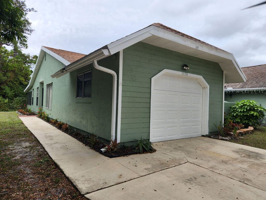 Photo of 1358 SE Rivergreen Circle, Port Saint Lucie, FL 34952 (MLS # R10942953)