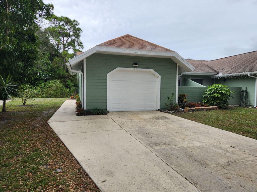Photo of 1358 SE Rivergreen Circle, Port Saint Lucie, FL 34952 (MLS # R10942953)
