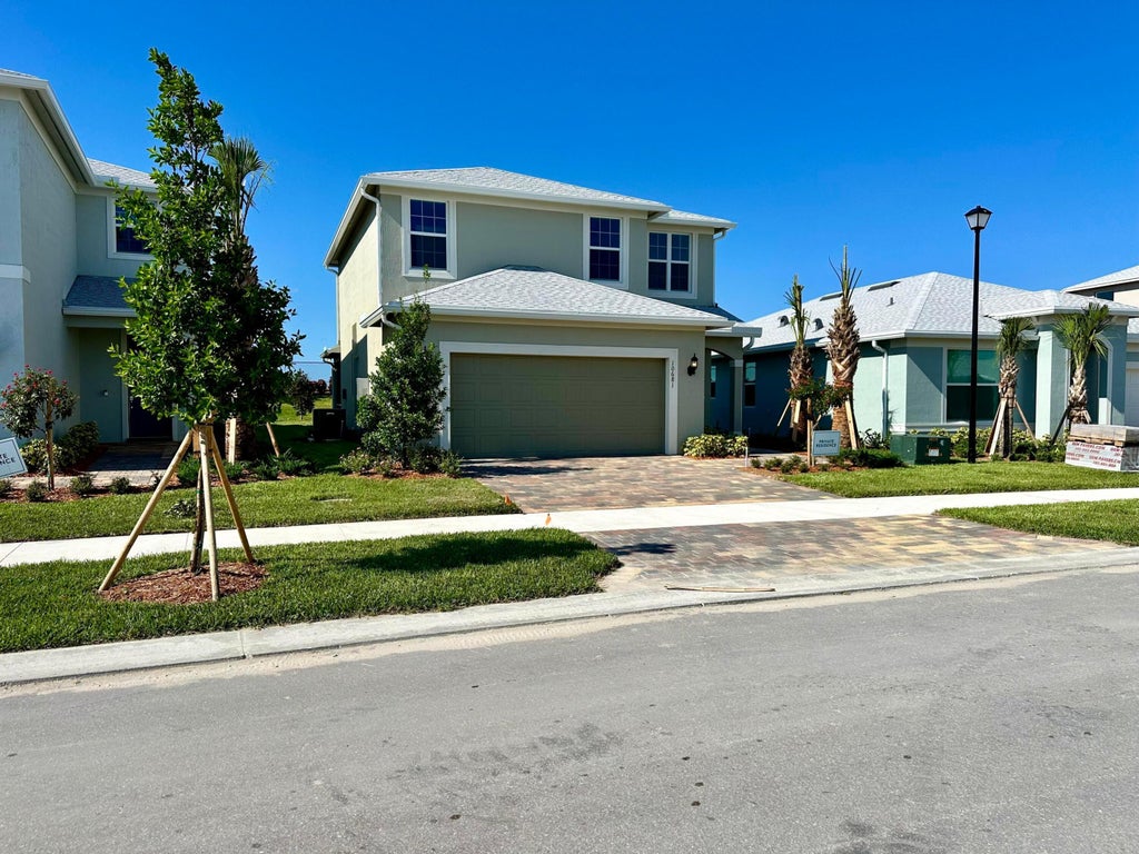 Photo of 10681 SW MORNING GLORY Drive, Port Saint Lucie, FL 34987 (MLS # B26076728)