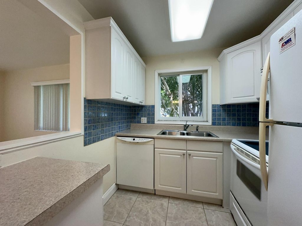 Photo of 379 Northampton S, West Palm Beach, FL 33417 (MLS # R11147353)