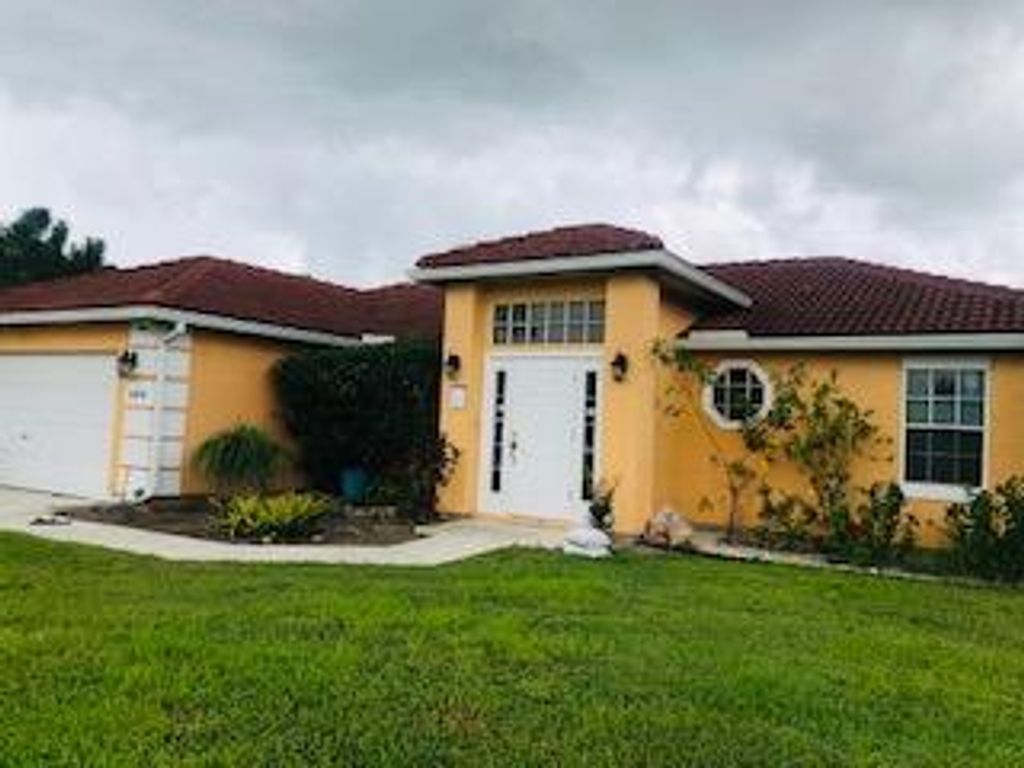 Photo of 494 SW Paar Drive Dr, Port St Lucie, FL 34953 (MLS # R10739723)