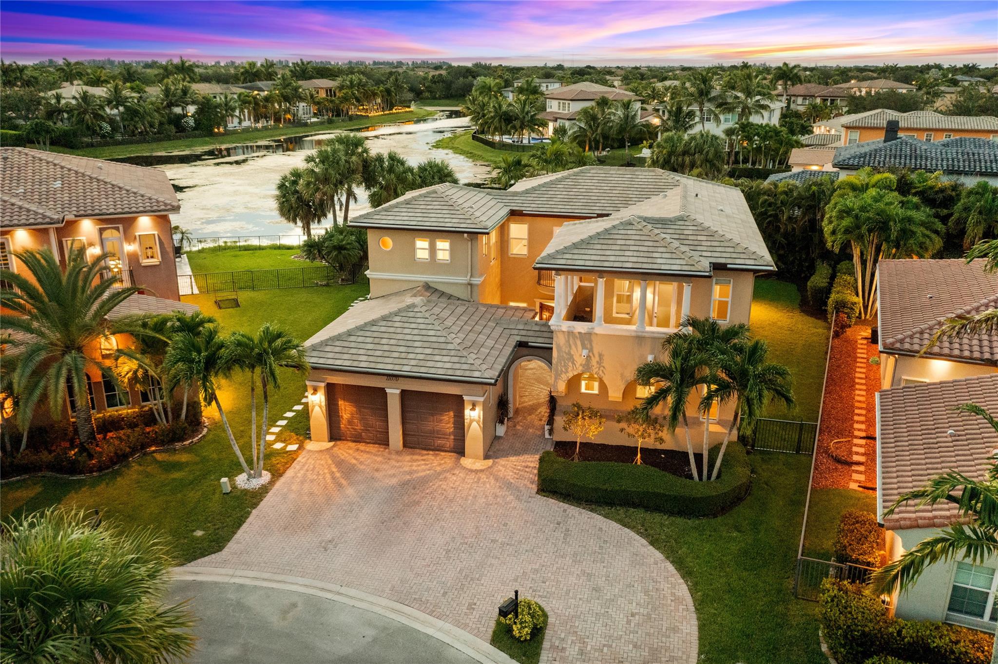 Welcome to Your Next Chapter! Over $250k in Upgrades! Features Include 5 Beds, Plus Office, Plus a Bonus/ Media Room, 4 Full Baths, ALL IMPACT WINDOWS, 2022 ROOF, Pergola, Extended Travertine Deck, Saltwater Heated Pool and Spa, Oversized Culdesac Lot, Fully Fenced Yard w/ Grass for Pets and Kids, Amazing Lake Views, Gourmet Kitchen w/ Quartz Countertops, New Refinished Wood Floors, Custom Closets, Large Circular Driveway, Downstairs Primary Suite Plus Another Bedroom, Plus an Office, 3 More Bedrooms Up Plus Media Room, Incredible Sunset Views, Resort Style Amenities, 2 Clubhouses, New Splash Park, Fitness Center, Pools, Tennis, Basketball and PickleBall Courts and All Included w/ Low HOA! Close to Sawgrass Expwy and Zoned for Parkland's A Rated Schools. Live the Parkland Lifestyle Here!