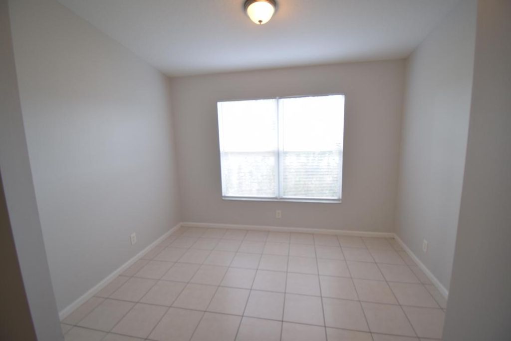 Photo of 538 SW Baoy Avenue, Port Saint Lucie, FL 34953 (MLS # R11158941)