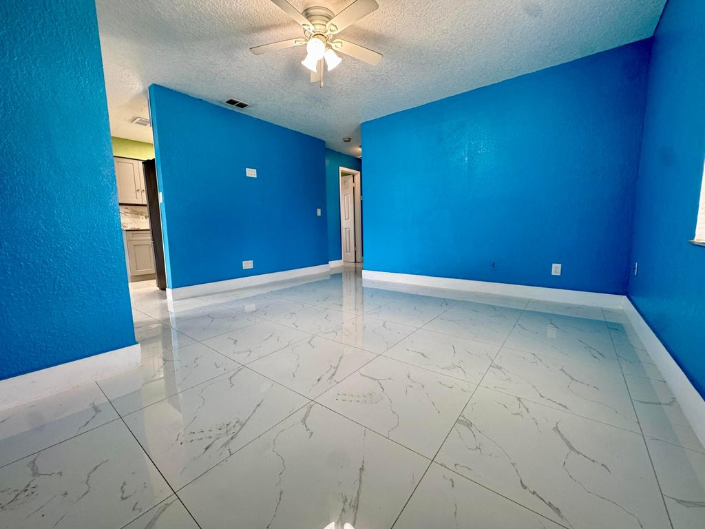 Photo of 4008 Avenue I Avenue, Fort Pierce, FL 34950 (MLS # R11092341)