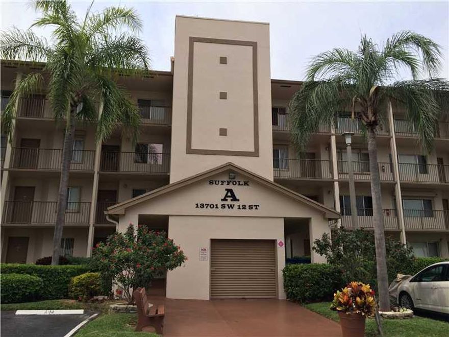 PRICE REDUCED TO SELL! LOVELY 4TH FL HOME LOCATED ON NEW SIDE OF CENTURY VILLAGE.LARGE KITC W/ BRKFST AREA*OPEN LIVING & DINING ROOM*LARGE MSTR BDRM W/ HUGE WALK IN CLOSET.ENJOY FANTASTIC LAKE VIEW FROM SCREENED PORCH.SPECIAL EXTRAS INCLUDE W/D IN UNIT &  ACCORDIAN HURRICANE SHUTTERS ON ALL WINDOWS,FRONT DOOR & PATIO SLIDING DOORS.MILLION DOLLAR CLUBHSE,2 FITNESS CENTERS,24 HR SECURITY,8 SWIMMING POOLS,COURTESY BUSES,TENNIS,MOVIES, THEATRE,SHOWS,BILLIARDS,PHARMACY,CAFE,GOLF,MUCH MORE.