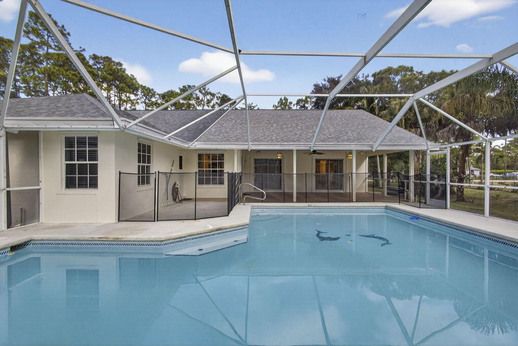 Photo of 15098 77th Place N, Loxahatchee, FL 33470 (MLS # R11147617)